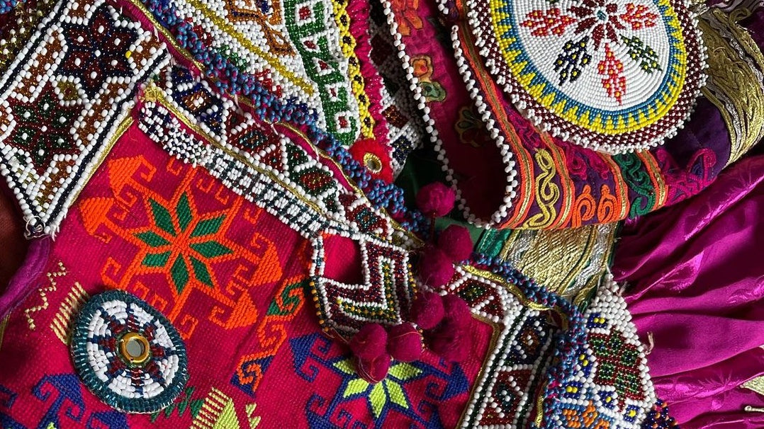 The Art of Crafting Afghan Kuchi Dresses